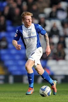 Images Dated 8th March 2014: Chris Burke Faces Off Against Queens Park Rangers in Sky Bet Championship Clash at St