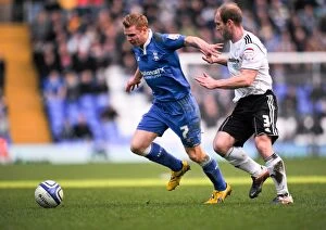 Images Dated 3rd March 2012: Chris Burke vs Gareth Roberts: A Championship Showdown - Birmingham City vs Derby County