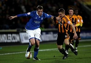 Images Dated 7th December 2011: Chris Wood vs. Andy Dawson: A Fierce Battle for Possession in Birmingham City's Npower