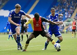 Soccer Football Birmpics Collection: Clash at Cardiff City Stadium: Donaldson Faces Off Against Turner and Peltier