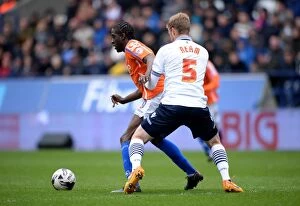 Sky Bet Championship - Bolton Wanderers v Birmingham City - Macron Stadium Collection: Clash at Macron Stadium: A Battle Between Donaldson and Ream in the Sky Bet Championship