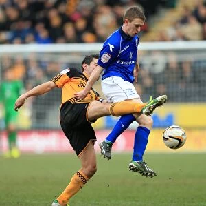 Images Dated 2nd March 2013: Clash of the Midfield Maestros: Koren vs. Ferguson in Hull City vs