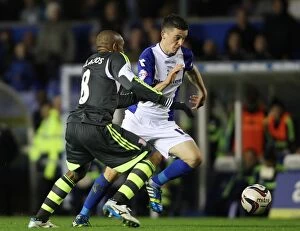 Capital One Cup : Round 4 : Birmingham City v Stoke City : St. Andrew's : 29-10-2013 Collection: Clash of the Midfield Maestros: Reilly vs. Palacios in Birmingham City vs