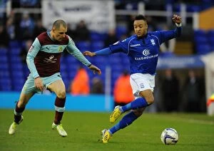 Images Dated 22nd December 2012: Clash of Midfield Titans: Nathan Redmond vs. Dean Marney in Birmingham City vs. Burnley