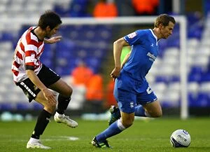 Images Dated 10th December 2011: Clash of the Midfield Titans: Spector vs. Stock (Birmingham City vs)