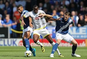 Images Dated 25th July 2015: Clash of the Midfielders: Akins, Davis, and Grounds Battle it Out in Burton Albion vs Birmingham