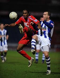 Images Dated 5th January 2008: Clash of the Titans: Mirfin vs. Jerome in FA Cup Third Round at The Galpharm Stadium (05-01-2008)
