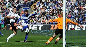 29-08-2010 v Bolton Wanderers, Reebok Stadium Collection: Craig Gardner Scores Birmingham City's Second Goal Against Bolton Wanderers in Barclays Premier