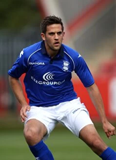 Images Dated 28th July 2012: Darren Carter Leads Birmingham City in Pre-Season Friendly against Cheltenham Town at Whaddon Road