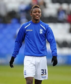 Images Dated 7th December 2013: Demarai Gray's Intense Focus: Birmingham City's Warm-Up Ahead of Middlesbrough Clash