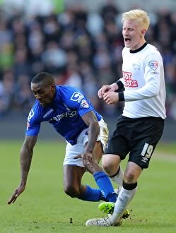 Images Dated 7th March 2015: Derby County vs Birmingham City: Lloyd Dyer Fouls Will Hughes in Intense Sky Bet Championship