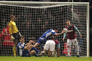 11-01-2011, Carling Cup Semi Final First Leg v West Ham United, Upton Park Collection: Dramatic Equalizer: Liam Ridgewell's Header Saves Birmingham City in Carling Cup Semi-Final vs