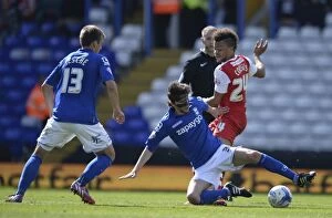 Images Dated 25th April 2015: Fabbrini vs. Cousins: A Tight Battle in Birmingham City vs Charlton Athletic (Sky Bet Championship)