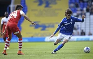 Images Dated 25th April 2015: Fabbrini vs Cousins: A Tight Battle in Birmingham City vs Charlton Athletic (Sky Bet Championship)