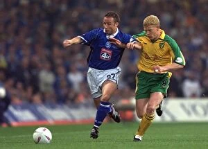Images Dated 12th May 2002: A Fierce Rivalry: Devlin vs. Holt's Intense Playoff Battle - Birmingham City vs. Norwich City (2002)