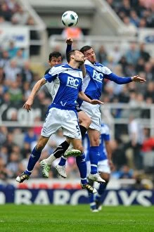 07-05-2011 v Newcastle United, St. James' Park Collection: Intense Aerial Clash: Ferguson vs. Barton, Birmingham City vs