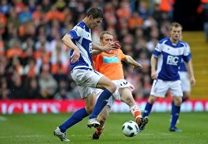 Images Dated 23rd October 2010: Intense Battle for the Ball: Ormerod vs. Zigic - Premier League Showdown (Birmingham City vs)