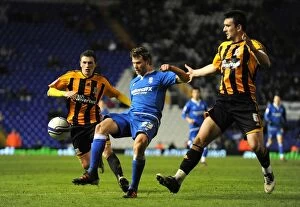 14-02-2012 v Hull City, St. Andrew's Collection: Intense Battle for Control: Spector Sandwiched Between Evans