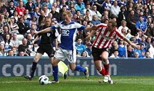 Images Dated 16th April 2011: Intense Battle: Larsson vs. Bardsley - Birmingham City vs. Sunderland (Barclays Premier League)