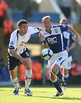 Images Dated 26th September 2009: Intense Rivalry: Bowyer vs. Cahill Clash at Birmingham City vs