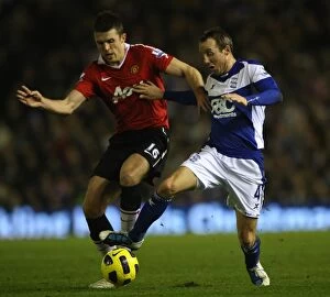 Images Dated 28th December 2010: Intense Rivalry: Carrick vs. Bowyer's Battle for Ball Possession (Birmingham City vs)
