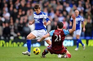 Images Dated 16th January 2011: Intense Rivalry: David Bentley vs. Ciaran Clark - Birmingham City vs