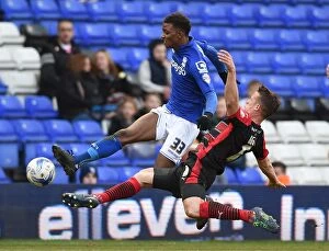 Images Dated 14th March 2015: Intense Rivalry: Demarai Gray vs. Jonathan Hogg Battle at St. Andrew's (Sky Bet Championship)