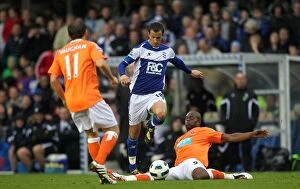 Images Dated 23rd October 2010: Intense Rivalry: Fahey vs. Harewood Clash in Birmingham City vs