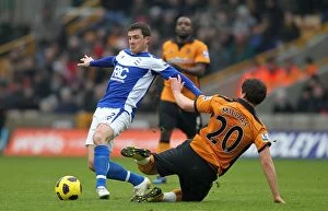 Images Dated 12th December 2010: Intense Rivalry: Ferguson vs. Milijas - Wolverhampton Wanderers vs