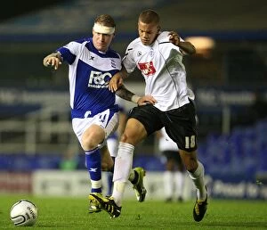 Images Dated 26th August 2010: Intense Rivalry: Garry O'Connor vs. Josh Thompson's Battle for Carling Cup Possession