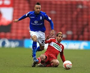 Images Dated 16th March 2013: Intense Rivalry: Haroun vs. Redmond Clash at Middlesbrough vs