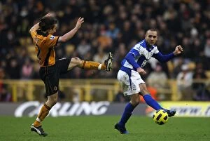 Images Dated 12th December 2010: Intense Rivalry: Hunt vs. Murphy Battle at Molineux (Birmingham City vs)