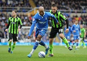 Images Dated 29th October 2011: Intense Rivalry: Marlon King vs. Marcos Painter - Birmingham City vs