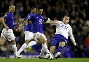 09-03-2011 v Everton, Goodison Park Collection: Intense Rivalry: Mikel Arteta vs. Jordan Mutch at Goodison Park
