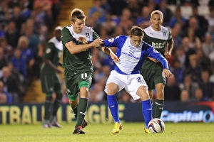 Intense Rivalry: Scott Allan vs. Dominic Blizzard - Battle for the Ball in Birmingham City vs. Plymouth Argyle's Capital One Cup Clash