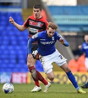 Images Dated 14th March 2015: Intense Rivalry: Shinnie vs. Coady Battle in Birmingham City vs Huddersfield Town