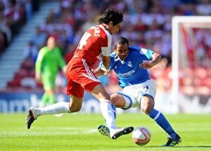21-08-2011 v Middlesbrough, Riverside Stadium Collection: Intense Rivalry: Williams vs. Beausejour - A Championship Showdown (2011): Middlesbrough vs