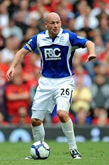 Images Dated 16th August 2009: Lee Carsley at Old Trafford: Birmingham City's Battle against Manchester United, August 16