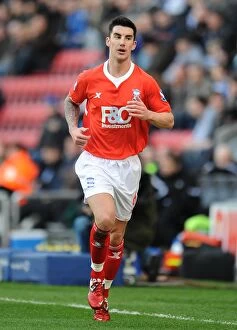 Images Dated 19th March 2011: Liam Ridgewell in Action for Birmingham City against Wigan Athletic at DW Stadium (19-03-2011)