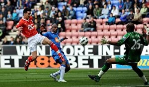 Images Dated 19th March 2011: Liam Ridgewell Scores Birmingham City's Historic Goal Against Wigan Athletic in Premier League
