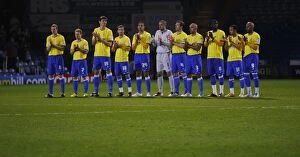 20-03-2012 v Portsmouth, Fratton Park Collection: Minutes Applause for Fabrice Muamba: A Moment of Silence at Fratton Park