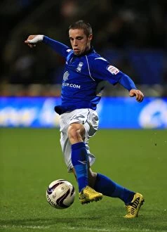 Images Dated 29th December 2012: Mitch Hancox in Action: Birmingham City vs. Bolton Wanderers - Npower Championship Clash at Reebok