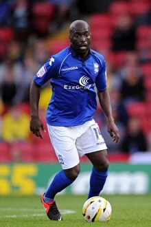 Images Dated 25th August 2012: Morgaro Gomis vs. Watford: A Championship Showdown (25-08-2012)