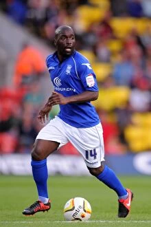 Images Dated 25th August 2012: Morgaro Gomis vs. Watford: Intense Face-Off in Birmingham City's Championship Match at Vicarage
