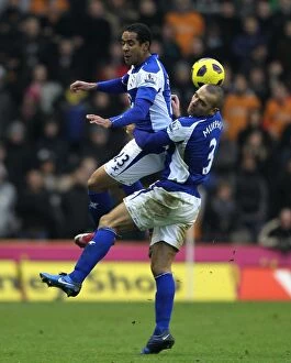 12-12-2010 v Wolverhampton Wanderers, Molineux Collection: Murphy and Beausejour's Aerial Battle: Birmingham City vs. Wolverhampton Wanderers
