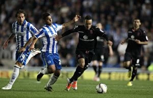 Images Dated 29th September 2012: Nathan Redmond vs. Liam Bridcutt: Intense Tackle in Npower Championship Clash between Brighton &