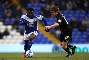 Images Dated 19th February 2011: Obafemi Martins Outsmarts James O'Connor: Birmingham City vs Sheffield Wednesday FA Cup Fifth