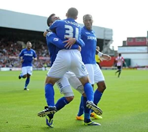 Images Dated 23rd August 2014: Paul Caddis Scores Penalty Goal: Birmingham City's Triumph at Brentford (Sky Bet Championship)