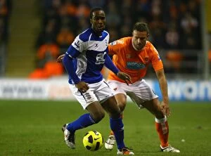 Images Dated 4th January 2011: Pressure Cooker Clash: Jerome vs. Evatt in Birmingham's Premier League Battle (04-01-2011)