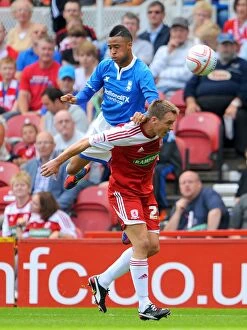 21-08-2011 v Middlesbrough, Riverside Stadium Collection: Red-Hot Rivalry: Nathan Redmond vs. Tony McMahon in the Npower Championship Clash between